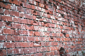 Old brick wall with a crack