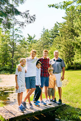 Fototapeta premium Portrait of happy mature father and his five sons