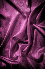 Texture, background, pattern. silk cloth red color. Iridescent with a more rigid drapery, this...