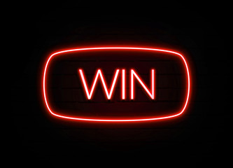 Win neon sign on brick wall background.