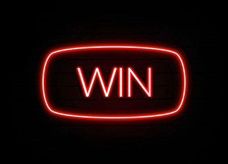 Win neon sign on brick wall background.