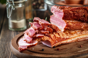 Smoked bacon with chopped slices, ready to prepare a traditional breakfast with eggs