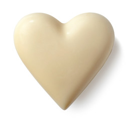 White chocolate heart on white background