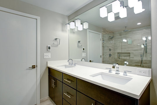 Elegant bathroom with espresso double vanity