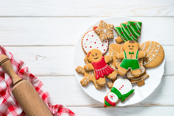Christmas gingerbread on white table top view.