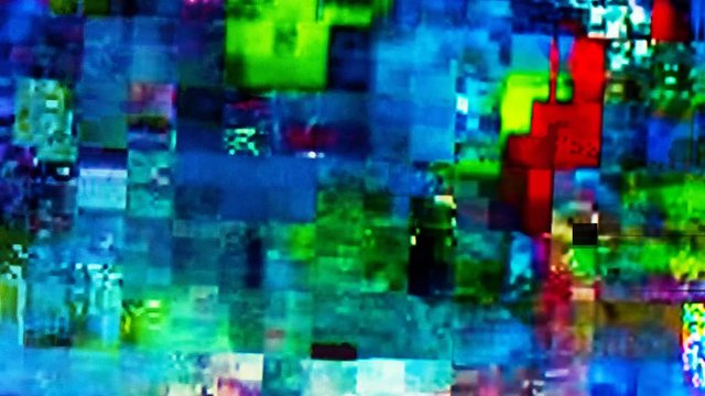 Digital TV glitch on television screen with misplaced squares, static effects and freezing problems during broadcast failure