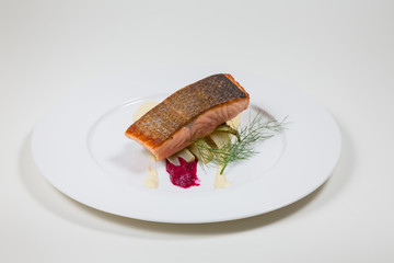 Salmon Steak on a white plate on a white background
