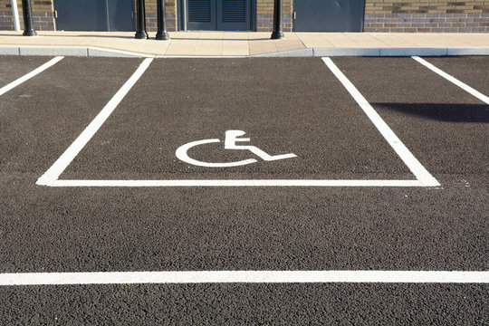 Disabled user car park space with wheelchair symbol