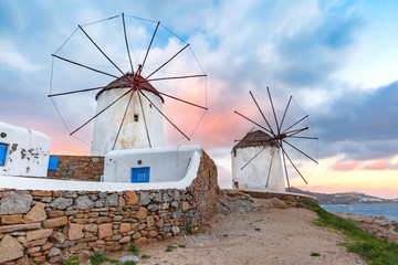 Famous view, Traditional windmills on the island Mykonos, The island of the winds, at sunrise,...