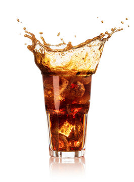 glass of cola with big splash isolated on white background