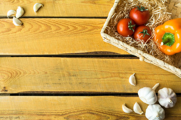Healty nutrition scene: vegan ingredients and copyspace on wooden board