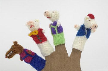 finger puppets on white background