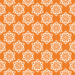 White floral seamless pattern on orange background