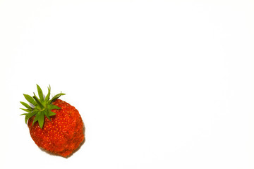 One large strawberry isolated on a white background