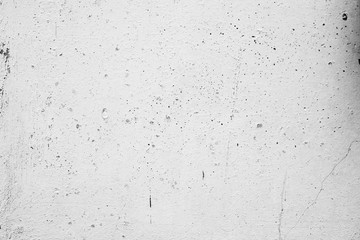 Wall fragment with scratches and cracks