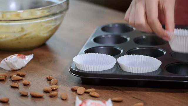 Baking Cupcake, putting cupcake wrappers in baking tray