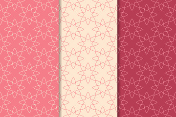 Cherry red geometric ornaments. Set of seamless patterns