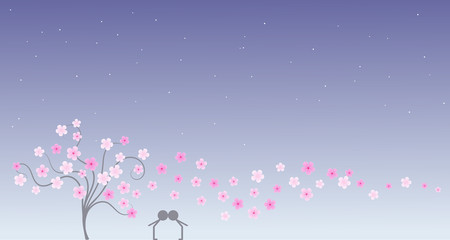 Silhouette of young couple in love kissing next to a tree and under cherry petals, blossoms and the stars in anniversary day at night