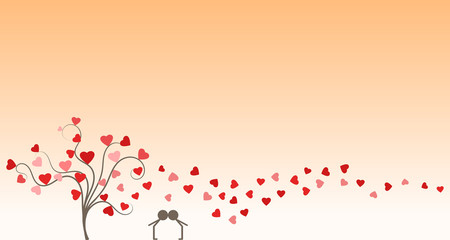 Silhouette of young couple in love kissing next to a tree and under hearts in anniversary day at sunset