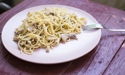 Spaghetti with chopped meat on a plate.