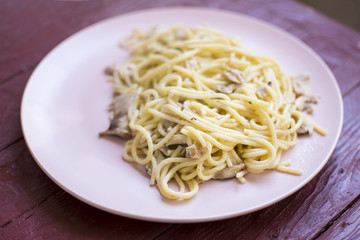 Spaghetti with chopped meat on a plate.