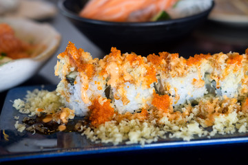 Sushi rolls on a blur plate