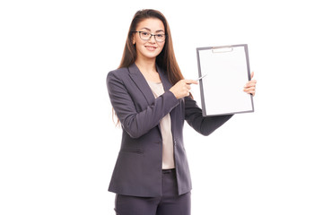 Portrait of female financial advisor posing with document on white background