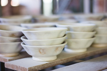 Fototapeta na wymiar ceramic bowls stack on table