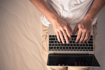 Fototapeta na wymiar background of hand is typing on keyboard computer.