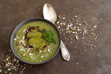 Vegetarian spinach soup with sesame seeds and flax.