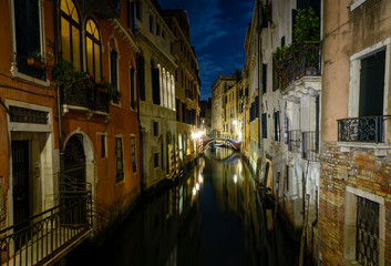 Long night exposure of an old Venetian canal in horizontal view