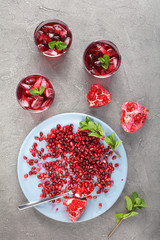cold pomegranate juice with ice cubes