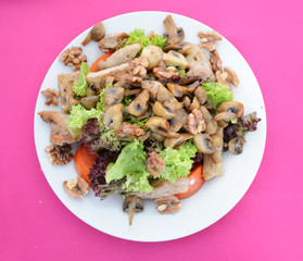 Beautiful salad on a white plate.