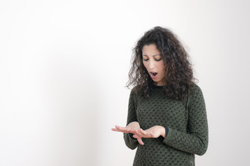 woman looking at her hands
