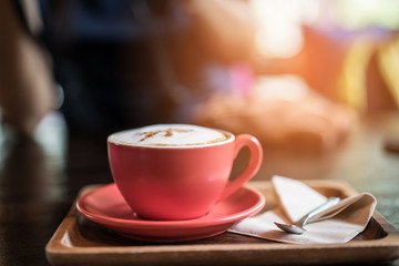 coffee latte on table in cafe shop. coffee break and relaxing concept.