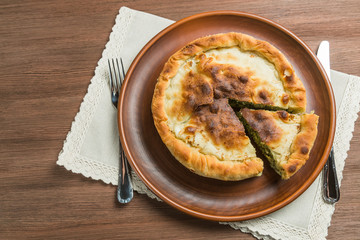 Greek pot pie spanakopita. Close up. The view from the top. Copy-space.