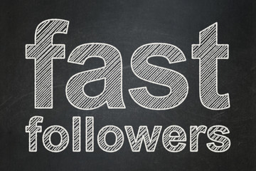 Business concept: text Fast Followers on Black chalkboard background