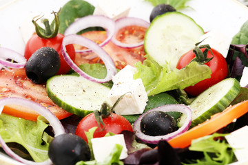 Salad with cheese and fresh vegetables and olives. Greek salad.