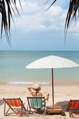 Woman on a tropical beach