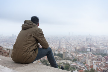 Man with Barcelona view