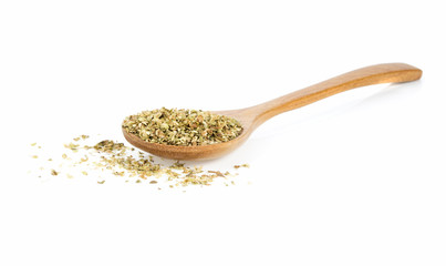 dried oregano in wooden spoon isolated on a white background