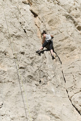 young woman climbing