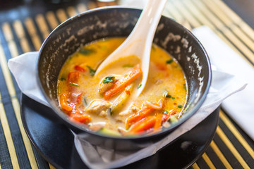 Tom Yum thai soup in the bowl