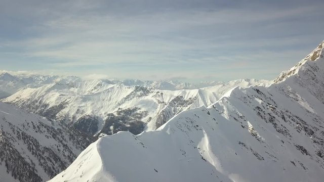 Aerial drone moving slowly forwards - over Austria beautiful winter Landscape snow cold 4k 