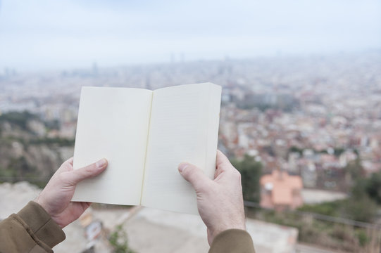 Hands Holding A Book