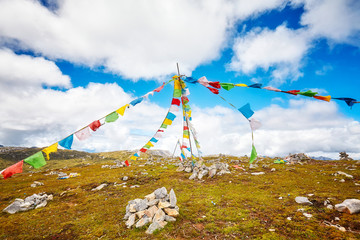 Buddhist prayer flags in the Shika Snow Mountain scenic area, Yunnan Province, China.