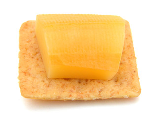 Delicious crackers with cheese on white background