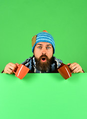 October and November beverage idea. Man in warm hat