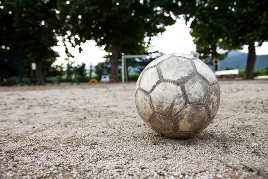 Old leather soccer ball in school asia 