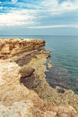 Fototapeta na wymiar Rocky cape of the coast of the Mediterranean Sea on Cyprus